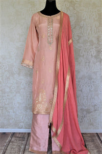 Shop elegant dusty pink embroidered silk palazzo suit online in USA with dupatta. Elevate your ethnic style on weddings and festive occasions with stunning designer Anarkali suits, sharara suits, palazzo suits, salwar suits from Pure Elegance Indian fashion boutique in USA.-full view