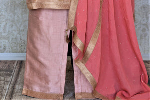 Shop elegant dusty pink embroidered silk palazzo suit online in USA with dupatta. Elevate your ethnic style on weddings and festive occasions with stunning designer Anarkali suits, sharara suits, palazzo suits, salwar suits from Pure Elegance Indian fashion boutique in USA.-palazzo