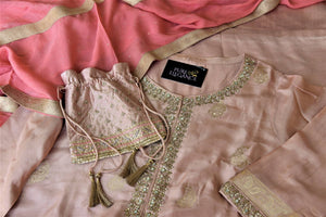 Shop elegant dusty pink embroidered silk palazzo suit online in USA with dupatta. Elevate your ethnic style on weddings and festive occasions with stunning designer Anarkali suits, sharara suits, palazzo suits, salwar suits from Pure Elegance Indian fashion boutique in USA.-details