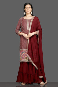 Shop beautiful wine color embroidered sharara suit with dupatta online in USA. Flaunt your sartorial choices on special occasions with beautiful designer dresses, Anarkali suits, traditional salwar suits, Indian lehengas from Pure Elegance Indian fashion boutique in USA. -full view