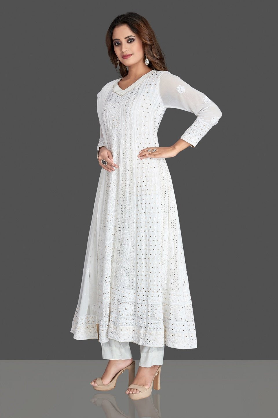 Shop beautiful white Lucknowi chikankari work georgette Anarkali suit online in USA. Flaunt your sartorial choice with beautiful embroidered Anarkali, sharara suits, designer lehengas, designer gowns from Pure Elegance Indian saree store in USA.-full view