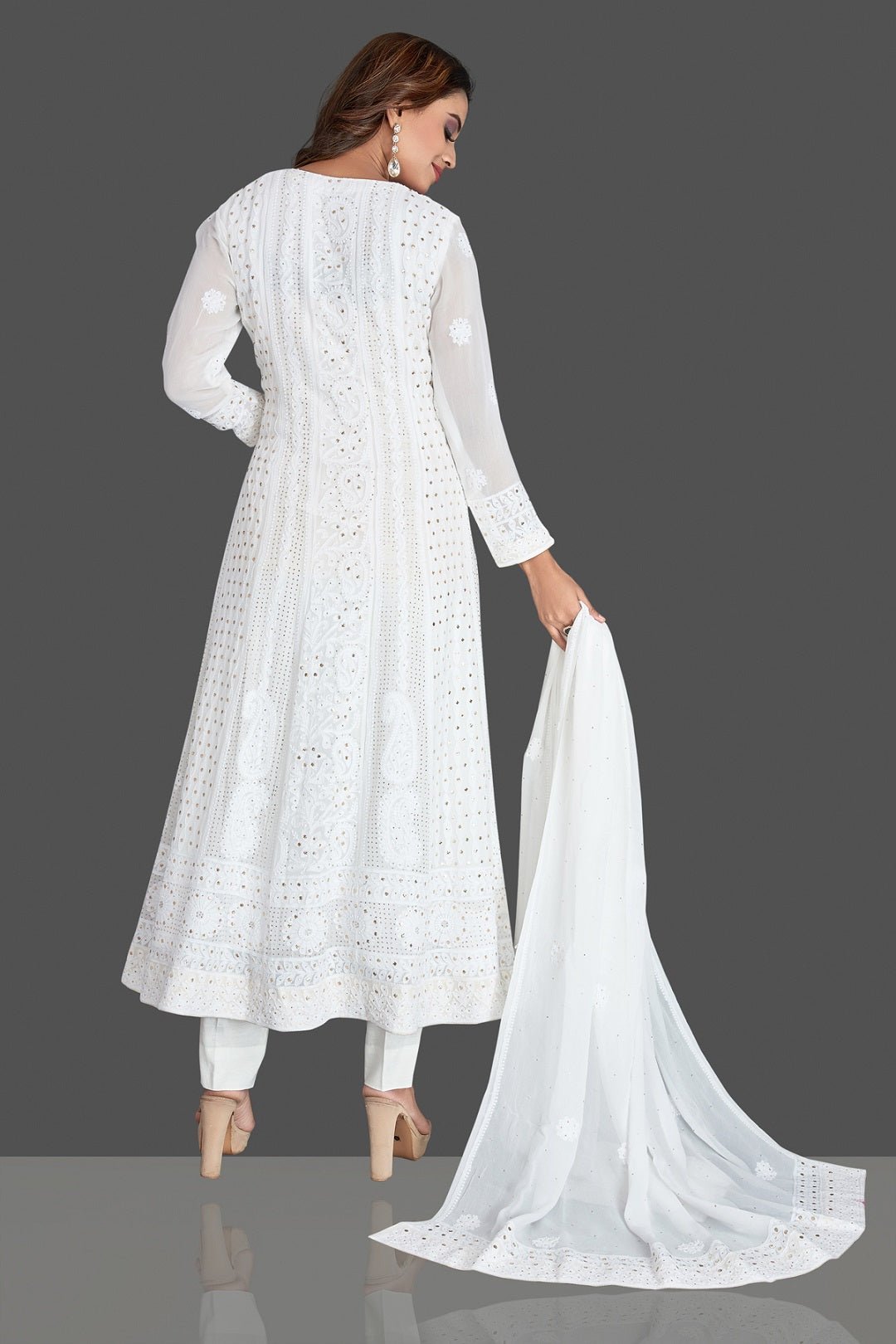 Shop beautiful white Lucknowi chikankari work georgette Anarkali suit online in USA. Flaunt your sartorial choice with beautiful embroidered Anarkali, sharara suits, designer lehengas, designer gowns from Pure Elegance Indian saree store in USA.-back