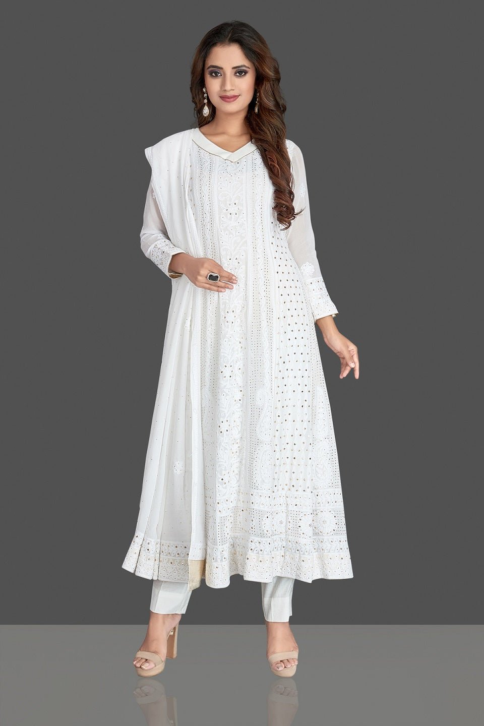 Shop beautiful white Lucknowi chikankari work georgette Anarkali suit online in USA. Flaunt your sartorial choice with beautiful embroidered Anarkali, sharara suits, designer lehengas, designer gowns from Pure Elegance Indian saree store in USA.-front