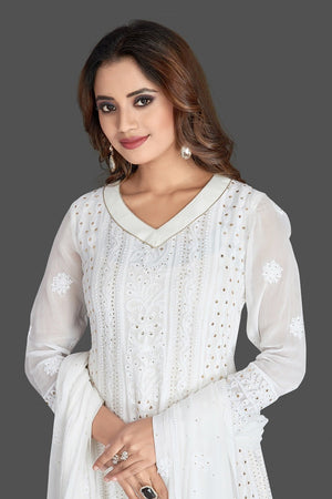 Shop beautiful white Lucknowi chikankari work georgette Anarkali suit online in USA. Flaunt your sartorial choice with beautiful embroidered Anarkali, sharara suits, designer lehengas, designer gowns from Pure Elegance Indian saree store in USA.-closeup
