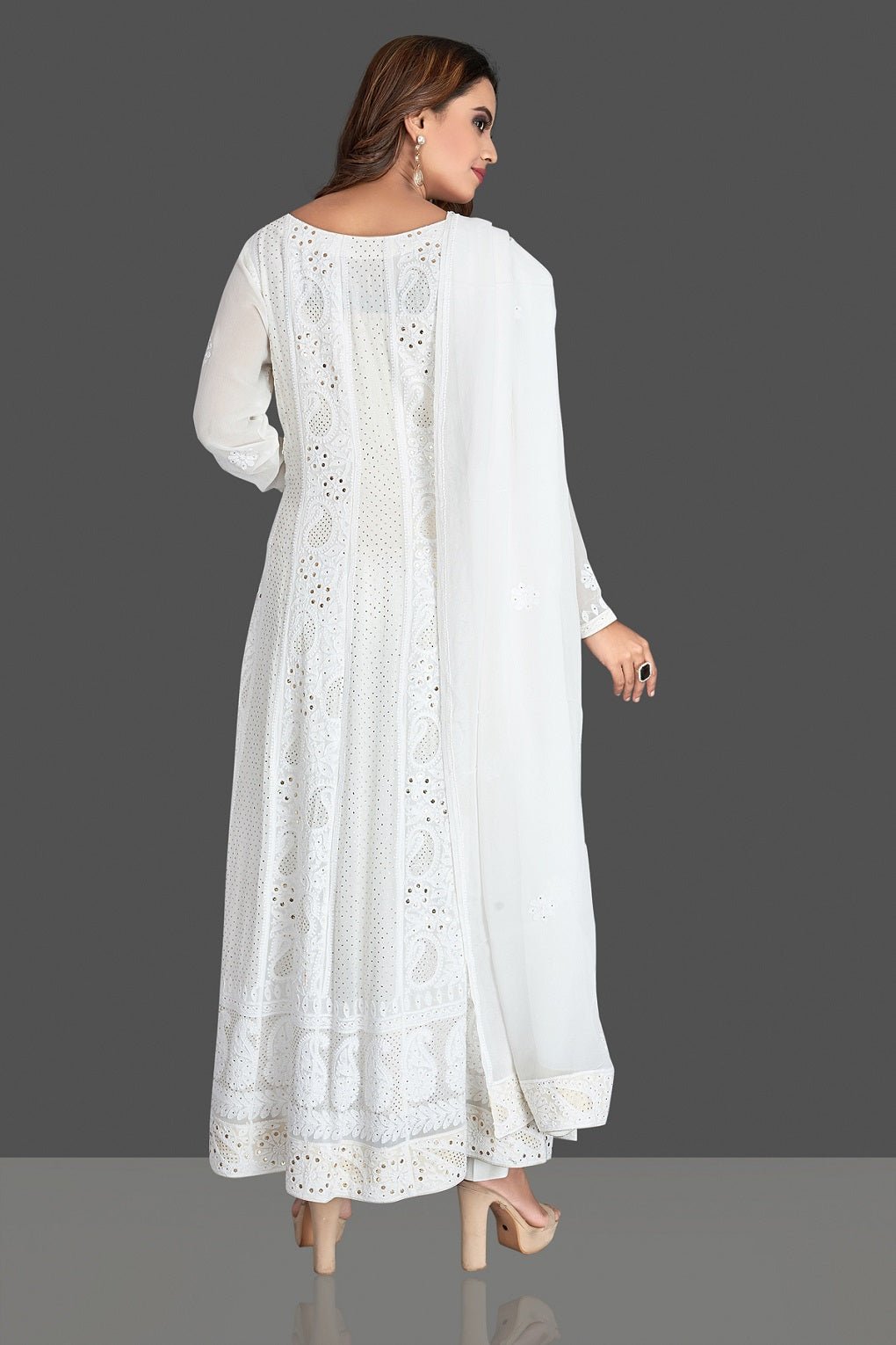 Buy stunning white georgette Lucknowi chikankari Anarkali suit online in USA. Flaunt your sartorial choice with beautiful embroidered Anarkali, sharara suits, designer lehengas, designer gowns from Pure Elegance Indian saree store in USA.-back
