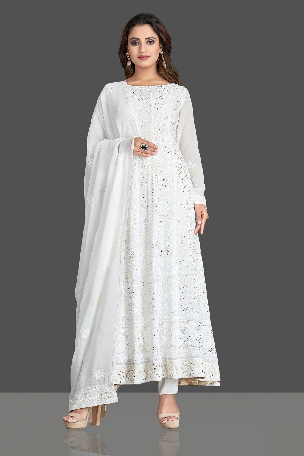 Buy stunning white georgette Lucknowi chikankari Anarkali suit online in USA. Flaunt your sartorial choice with beautiful embroidered Anarkali, sharara suits, designer lehengas, designer gowns from Pure Elegance Indian saree store in USA.-front