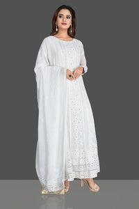 Buy gorgeous white georgette Lucknowi chikankari work Anarkali suit online in USA. Flaunt your sartorial choice with beautiful embroidered Anarkali, sharara suits, designer lehengas, designer gowns from Pure Elegance Indian saree store in USA.-full view