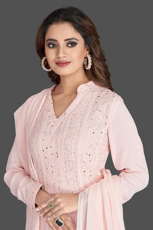 Shop beautiful powder pink Lucknowi chikankari work georgette Anarkali suit online in USA. Flaunt your sartorial choice with beautiful embroidered Anarkali, sharara suits, designer lehengas, designer gowns from Pure Elegance Indian saree store in USA.-closeup