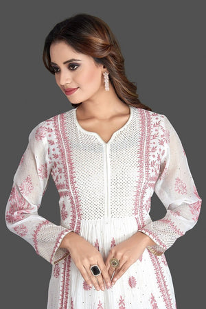 Shop beautiful white georgette suit online in USA with Lucknowi chikankari. Flaunt your sartorial choice with beautiful embroidered Anarkali, sharara suits, designer lehengas, designer gowns from Pure Elegance Indian saree store in USA.-closeup