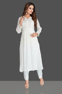 Shop stunning white georgette Lucknowi chikankari suit online in USA. Flaunt your sartorial choice with beautiful embroidered Anarkali, sharara suits, designer lehengas, designer gowns from Pure Elegance Indian saree store in USA.-full view