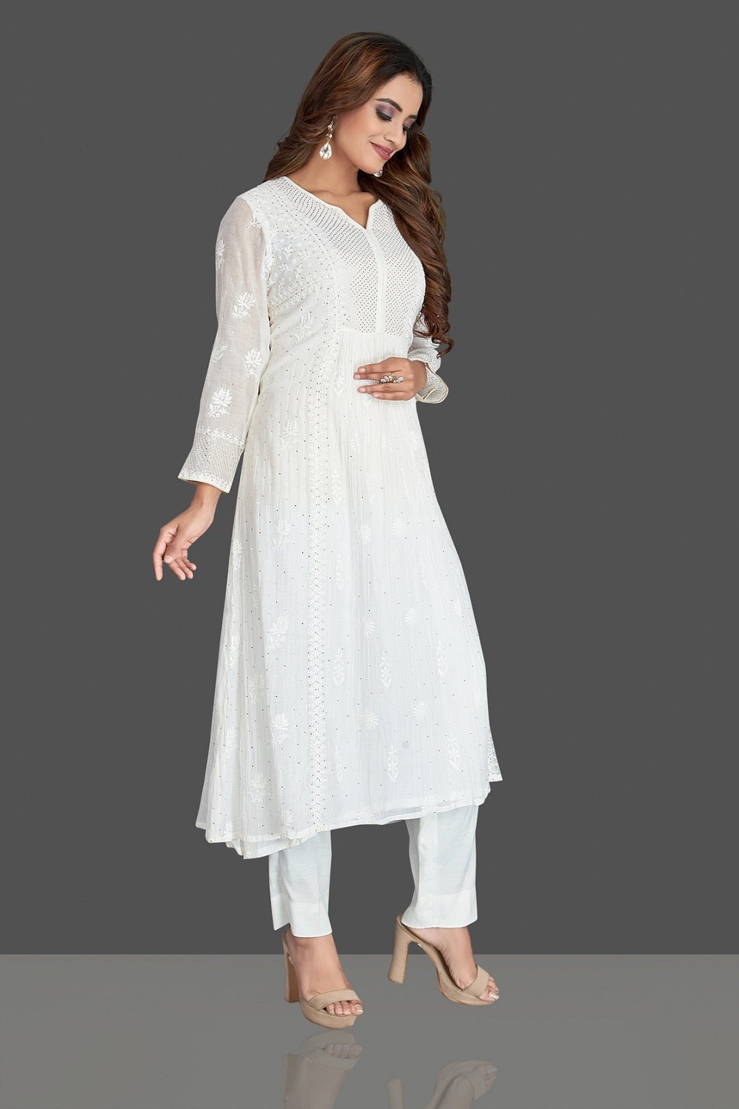 Shop stunning white georgette Lucknowi chikankari suit online in USA. Flaunt your sartorial choice with beautiful embroidered Anarkali, sharara suits, designer lehengas, designer gowns from Pure Elegance Indian saree store in USA.-side