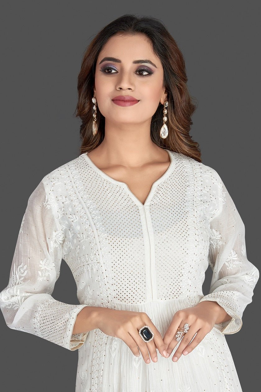 Shop stunning white georgette Lucknowi chikankari suit online in USA. Flaunt your sartorial choice with beautiful embroidered Anarkali, sharara suits, designer lehengas, designer gowns from Pure Elegance Indian saree store in USA.-closeup