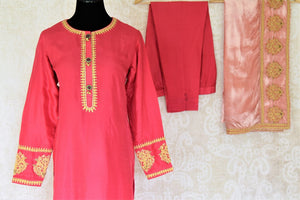 Buy pink embroidered designer silk suit online in USA with dupatta. Complete your ethnic look on special occasions with stunning designer Indian suits, Anarkali suits, designer dresses in USA from Pure Elegance Indian fashion store in USA.-front