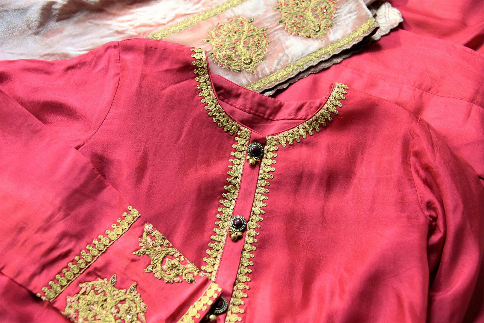 Buy pink embroidered designer silk suit online in USA with dupatta. Complete your ethnic look on special occasions with stunning designer Indian suits, Anarkali suits, designer dresses in USA from Pure Elegance Indian fashion store in USA.-details