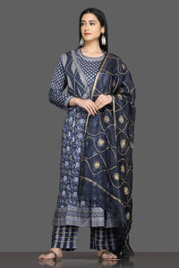 Shop beautiful blue printed silk suit online in USA with waist coat and dupatta. Shop for parties and festive occasions stunning designer suits, Anarkali suits, designer gowns, wedding lehengas from Pure Elegance Indian fashion store in USA.-full view