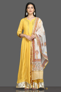 Buy beautiful yellow silk floorlength Anarkali suit online in USA with printed dupatta. Shop for parties and festive occasions stunning designer suits, Anarkali suits, designer gowns, wedding lehengas from Pure Elegance Indian fashion store in USA.-full view