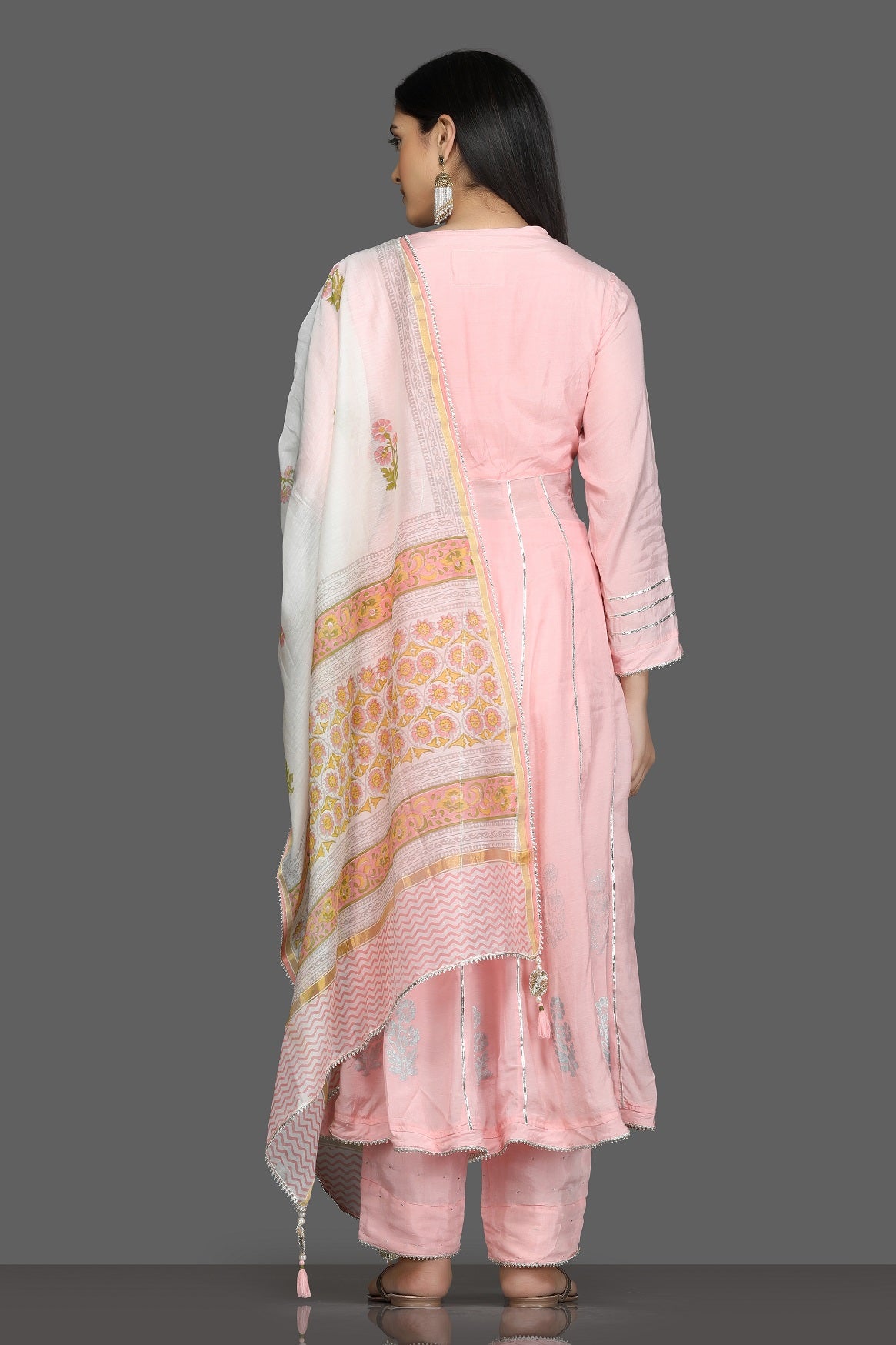 Shop stunning pink gota work silk suit online in USA with white printed dupatta. Shop for parties and festive occasions stunning designer suits, Anarkali suits, designer gowns, wedding lehengas from Pure Elegance Indian fashion store in USA.-back