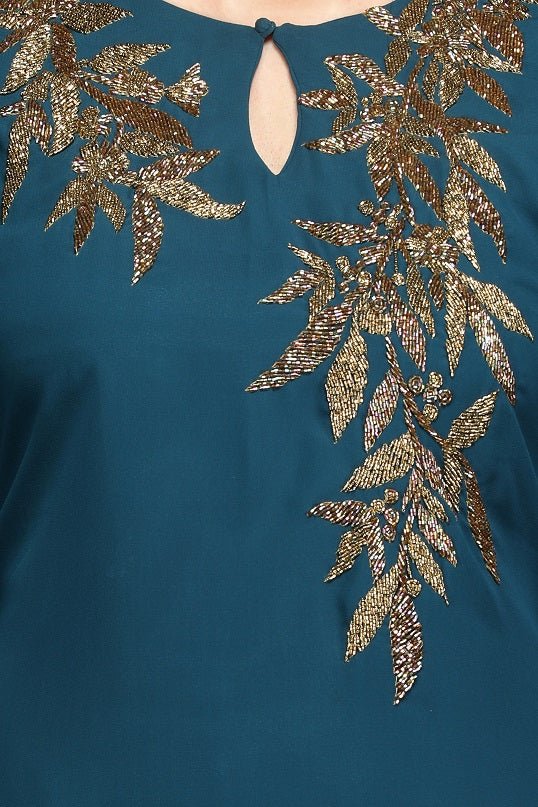 Shop beautiful teal green embroidered silk suit online in USA with net dupatta. Shop for parties and festive occasions stunning designer suits, Anarkali suits, designer gowns, wedding lehengas from Pure Elegance Indian fashion store in USA.-closeup