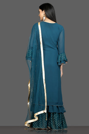 Shop beautiful teal green embroidered silk suit online in USA with net dupatta. Shop for parties and festive occasions stunning designer suits, Anarkali suits, designer gowns, wedding lehengas from Pure Elegance Indian fashion store in USA.-back