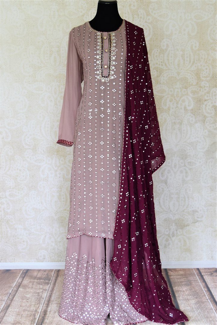 Buy stunning mauve pink embroidered chiffon sharara suit online in USA with wine color dupatta. Complete your ethnic look on special occasions with stunning designer Indian suits, Anarkali suits, designer dresses in USA from Pure Elegance Indian fashion store in USA.-full view
