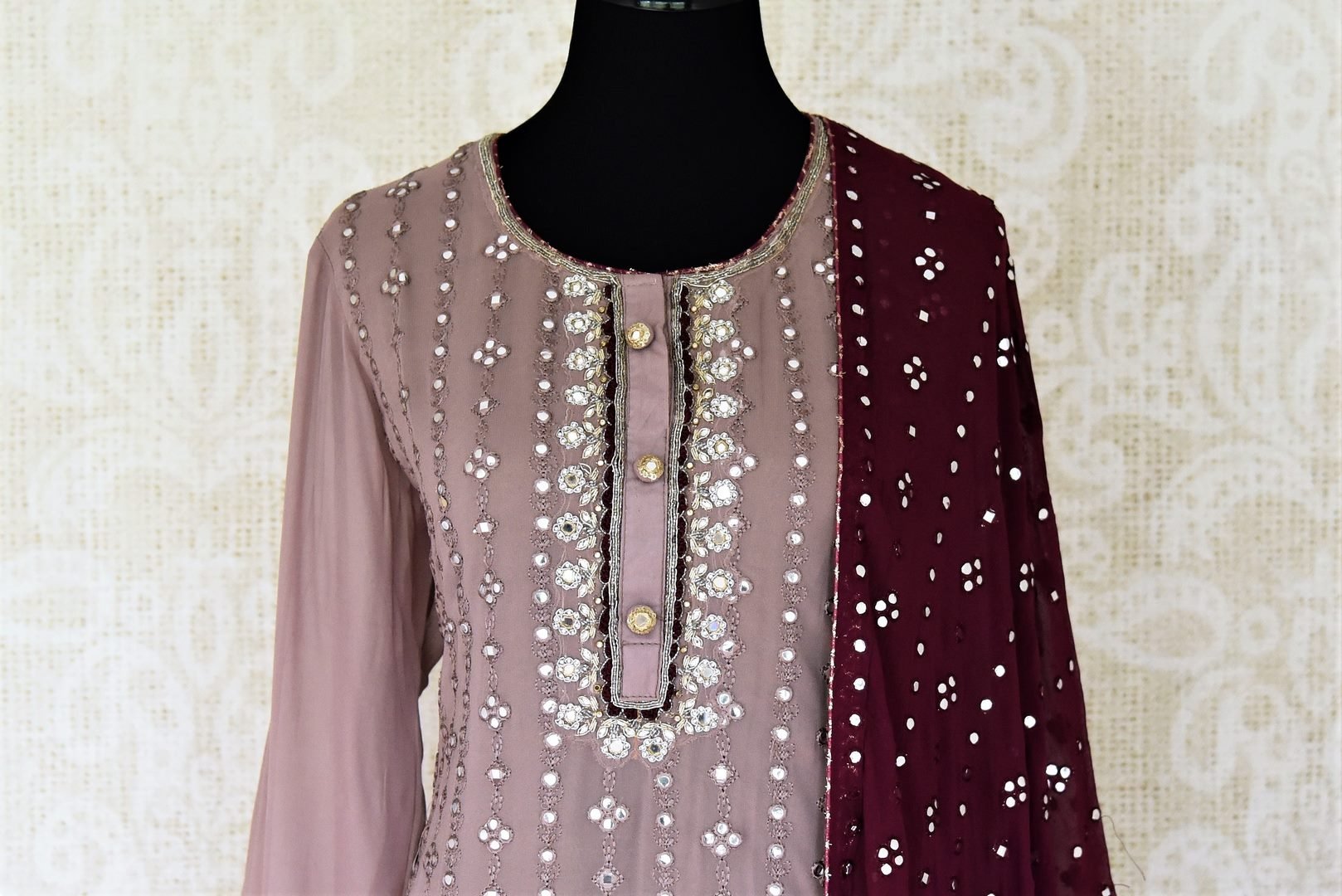 Buy stunning mauve pink embroidered chiffon sharara suit online in USA with wine color dupatta. Complete your ethnic look on special occasions with stunning designer Indian suits, Anarkali suits, designer dresses in USA from Pure Elegance Indian fashion store in USA.-front