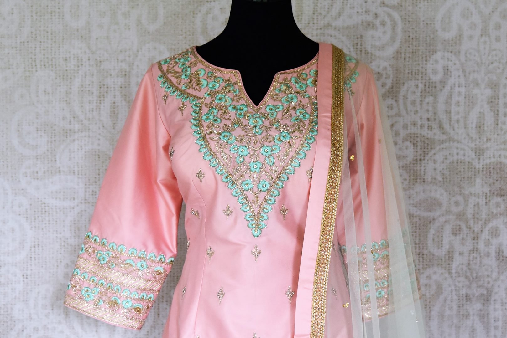 Buy gorgeous light pink and mint green hand embroidery silk suit online in USA with dupatta. Complete your ethnic look on special occasions with stunning designer Indian suits, Anarkali suits, designer dresses in USA from Pure Elegance Indian fashion store in USA.-front