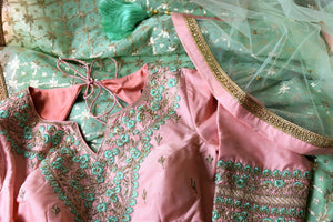 Buy gorgeous light pink and mint green hand embroidery silk suit online in USA with dupatta. Complete your ethnic look on special occasions with stunning designer Indian suits, Anarkali suits, designer dresses in USA from Pure Elegance Indian fashion store in USA.-details