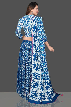 Buy beautiful blue and white Bagru block print skirt set with dupatta. Shop designer Indian clothing, wedding lehengas, designer Anarkali, gharara suits, Indian dresses in USA from Pure Elegance Indian fashions store for parties and special occasions.-back