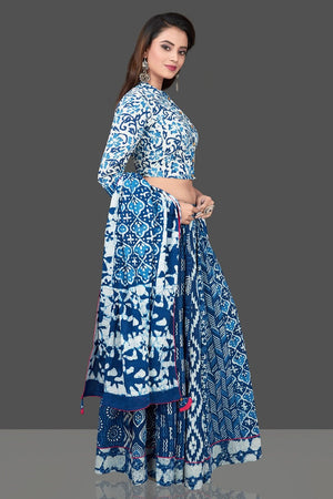 Buy gorgeous blue and white Bagru printed skirt set online in USA with dupatta. Shop designer Indian clothing, wedding lehengas, designer Anarkali, gharara suits, Indian dresses in USA from Pure Elegance Indian fashions store for parties and special occasions.-right