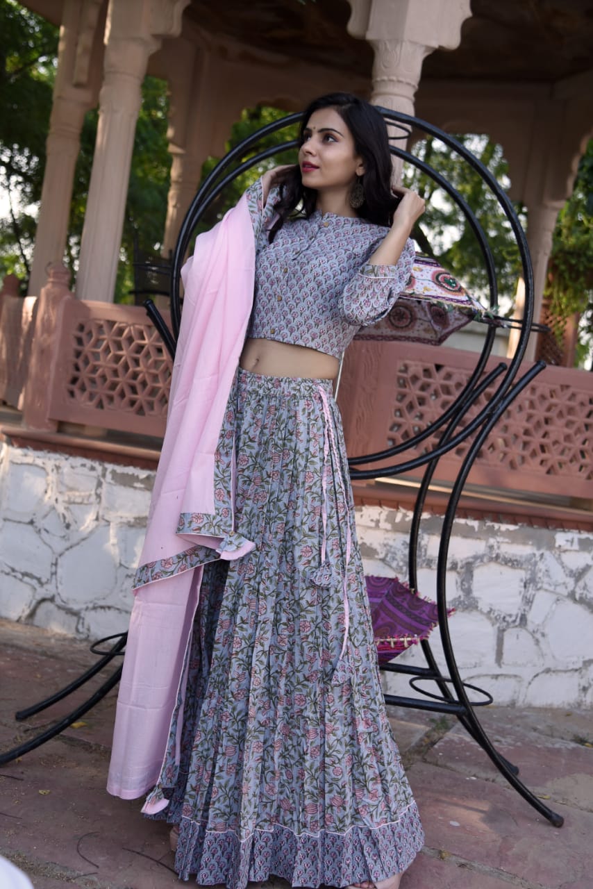 Shop beautiful grey hand block Bagru block print skirt set with pink dupatta. Shop designer Indian clothing, designer lehengas, designer Anarkali, gharara suits, palazzo suits, Indian dresses in USA from Pure Elegance Indian fashions store for parties and special occasions.-standing