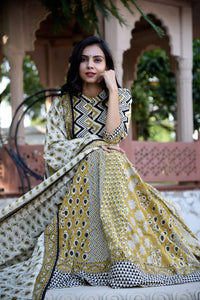 Buy gorgeous mustard Bagru block print skirt set with matching dupatta. Shop designer Indian clothing, designer lehengas, designer Anarkali, gharara suits, palazzo suits, Indian dresses in USA from Pure Elegance Indian fashions store for parties and special occasions.-front