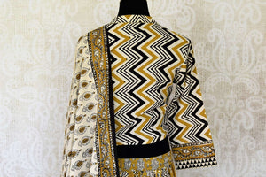 Buy gorgeous mustard Bagru block print skirt set with matching dupatta. Shop designer Indian clothing, designer lehengas, designer Anarkali, gharara suits, palazzo suits, Indian dresses in USA from Pure Elegance Indian fashions store for parties and special occasions.-pic 3