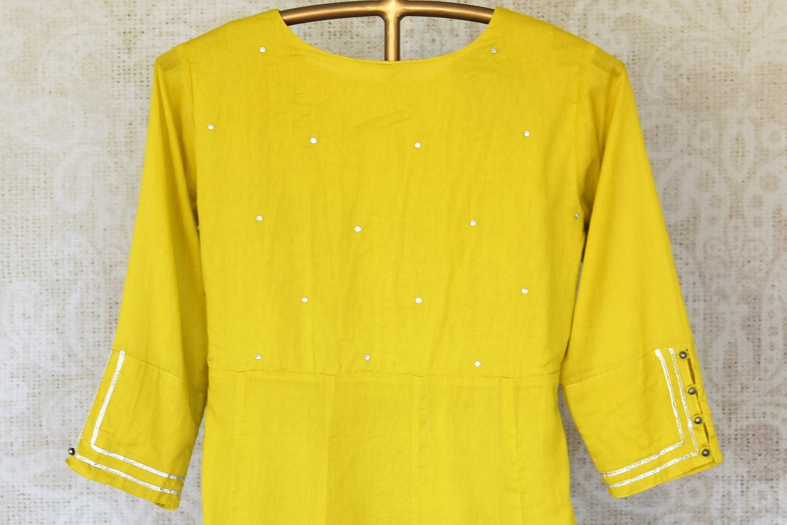 Shop stunning yellow cotton gota lace Anarkali online in USA. Shop beautiful designer stoles, embroidered dupattas, Banarasi dupattas, handwoven dupatta from Pure Elegance Indian fashion store in USA.-back