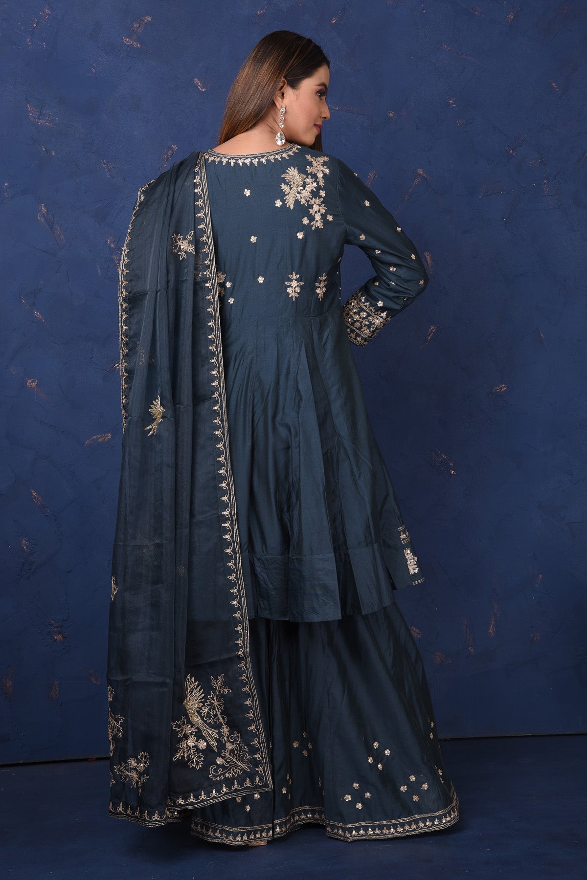 Buy beautiful dark blue embroidered sharara suit online in USA with dupatta, Be the center of attraction on festive occasions in beautiful designer suits, dresses, lehengas, designer gowns, from Pure Elegance Indian fashion store in USA.-back
