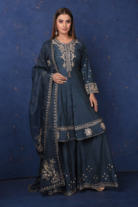 Buy beautiful dark blue embroidered sharara suit online in USA with dupatta, Be the center of attraction on festive occasions in beautiful designer suits, dresses, lehengas, designer gowns, from Pure Elegance Indian fashion store in USA.-full view