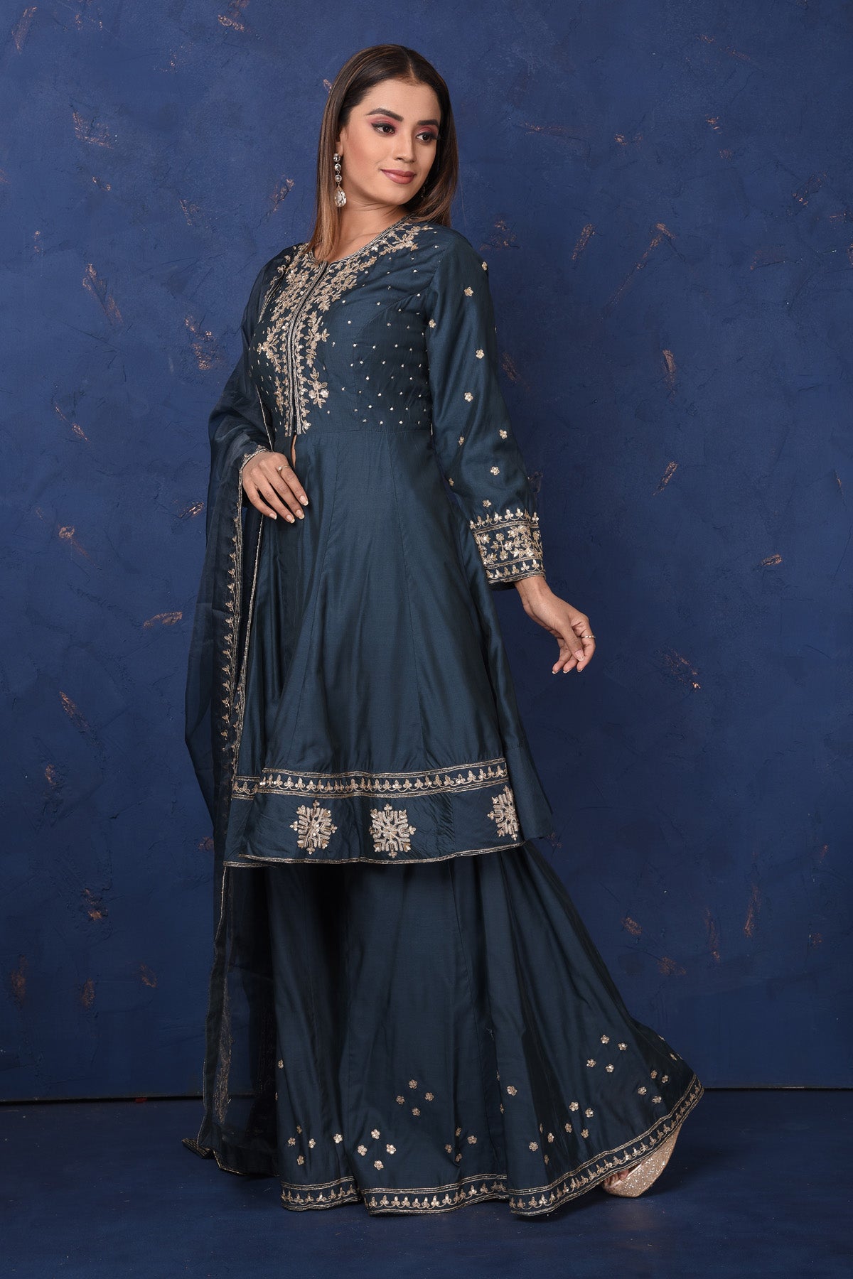Buy beautiful dark blue embroidered sharara suit online in USA with dupatta, Be the center of attraction on festive occasions in beautiful designer suits, dresses, lehengas, designer gowns, from Pure Elegance Indian fashion store in USA.-side