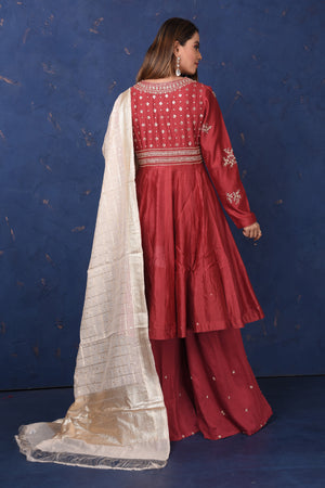 Shop gorgeous maroon embroidered sharara suit online in USA with dupatta, Be the center of attraction on festive occasions in beautiful designer suits, dresses, lehengas, designer gowns, from Pure Elegance Indian fashion store in USA.-back