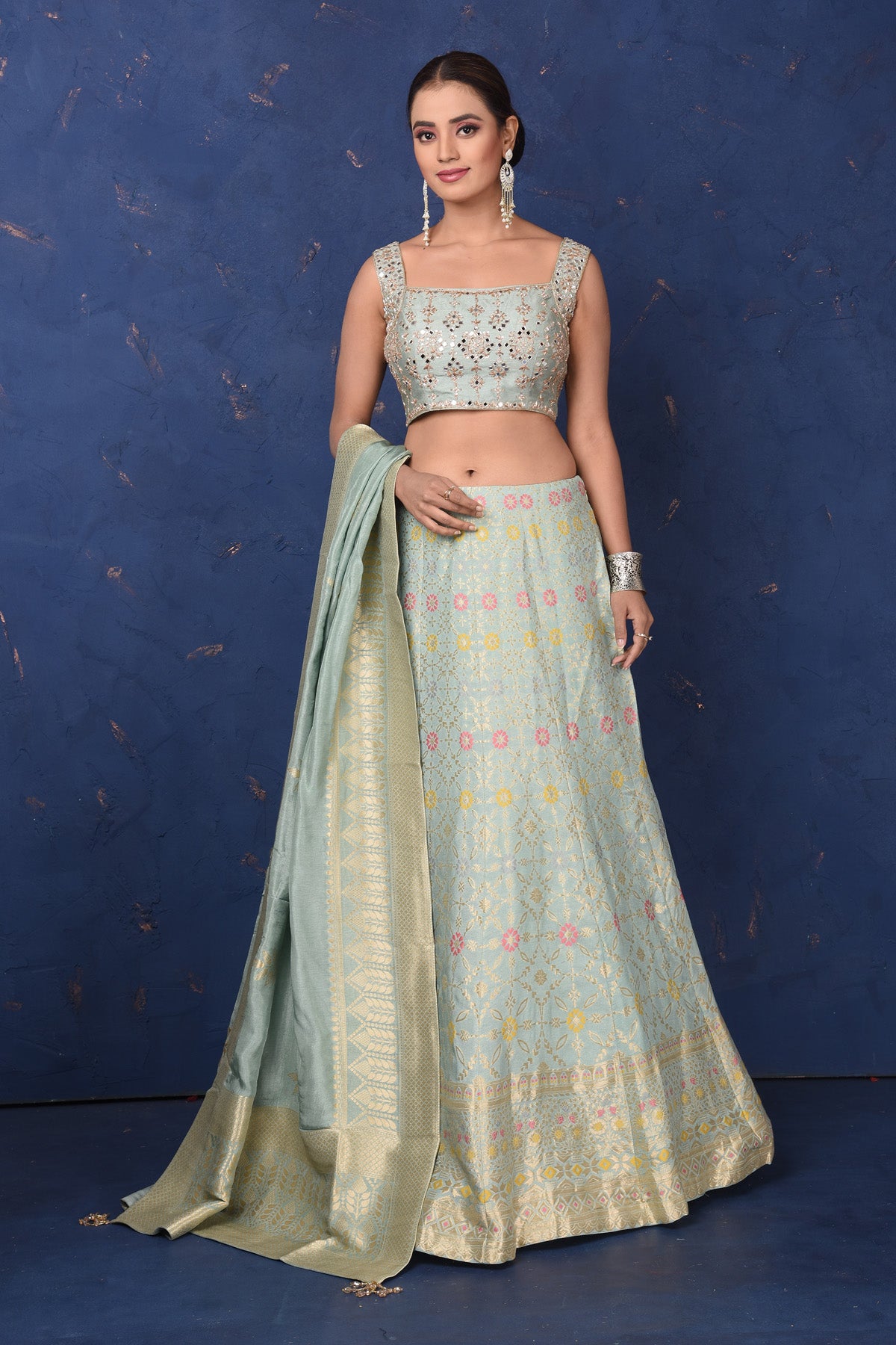 Shop beautiful mint green Banarasi embroidered lehenga online in USA with dupatta, Be the center of attraction on festive occasions in beautiful designer suits, dresses, lehengas, designer gowns, from Pure Elegance Indian fashion store in USA.-full view