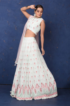 Buy stunning mint green embroidered designer lehenga online in USA with dupatta, Be the center of attraction on festive occasions in beautiful designer suits, dresses, lehengas, designer gowns, from Pure Elegance Indian fashion store in USA.-side