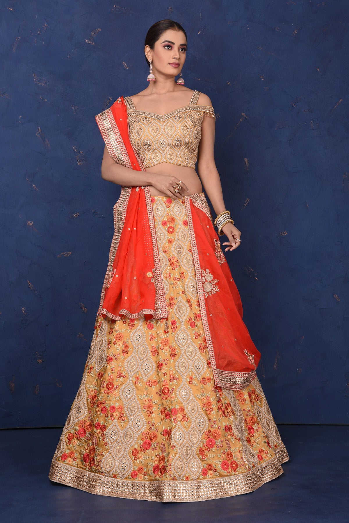 Shop stunning beige designer lehenga online in USA with floral embroidery, Be the center of attraction on festive occasions in beautiful designer suits, dresses, lehengas, designer gowns, from Pure Elegance Indian fashion store in USA.-full view