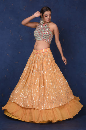 Shop beautiful mustard and golden embroidered contemporary lehenga online in USA. Set fashion goals on special occasions in exclusive designer lehengas, Indian suits, Anarkali dresses, designer gowns, bridal lehengas from Pure Elegance Indian fashion store in USA.-blouse