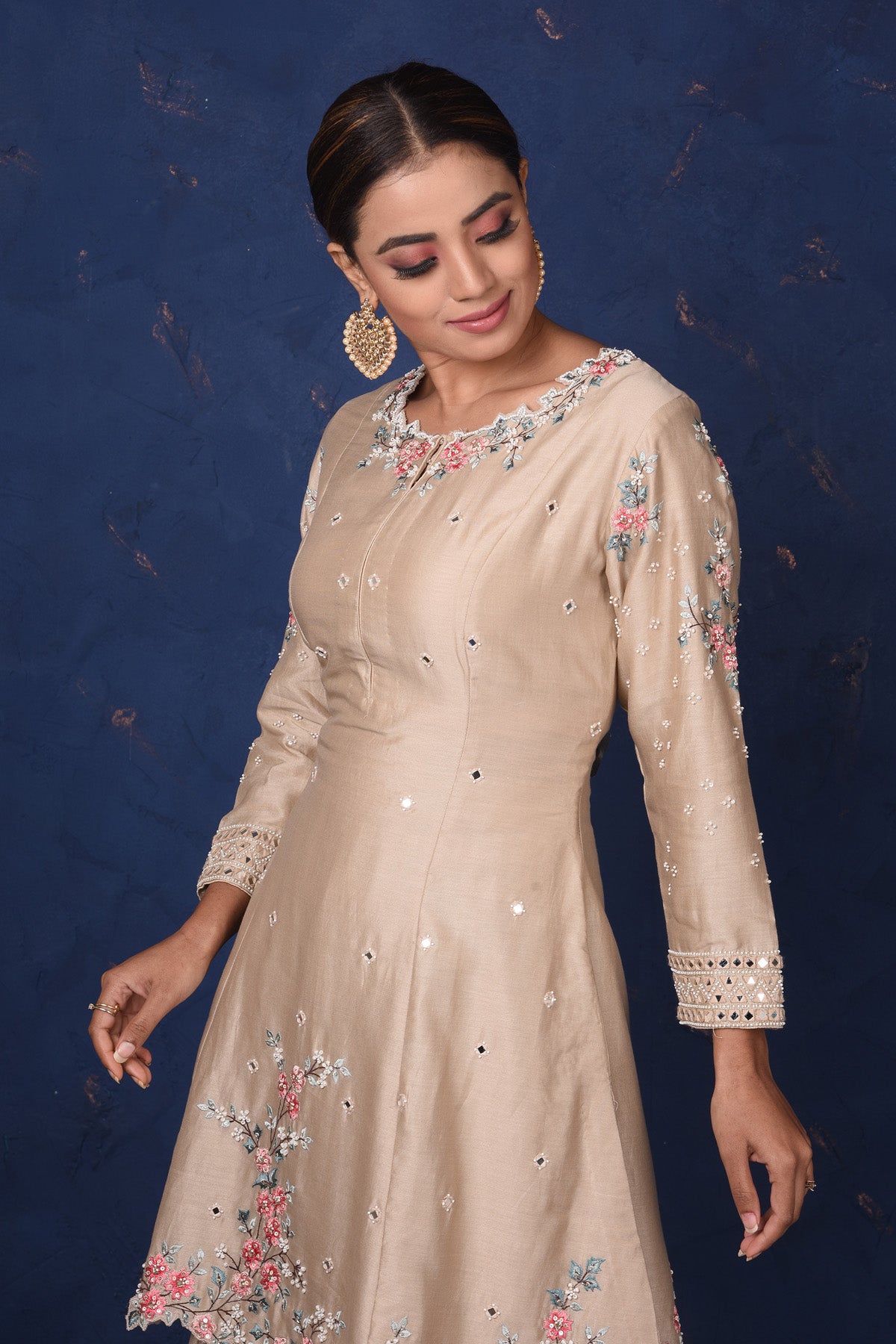 Shop stunning beige embroidered sharara suit online in USA with dupatta. Set fashion goals on special occasions in exclusive designer lehengas, Indian suits, Anarkali dresses, designer gowns, bridal lehengas from Pure Elegance Indian fashion store in USA.-closeup