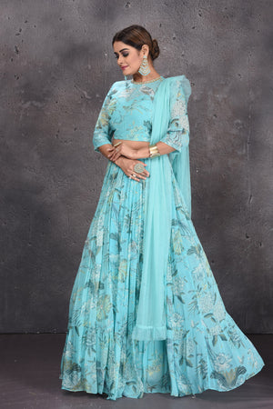Buy beautiful light blue floral print lehenga online in USA with dupatta. Look royal at weddings in this bespoke designer lehengas, wedding gowns, bridal lehengas, designer sarees, Anarkali suits, sharara suits, from Pure Elegance Indian fashion store in USA.-side