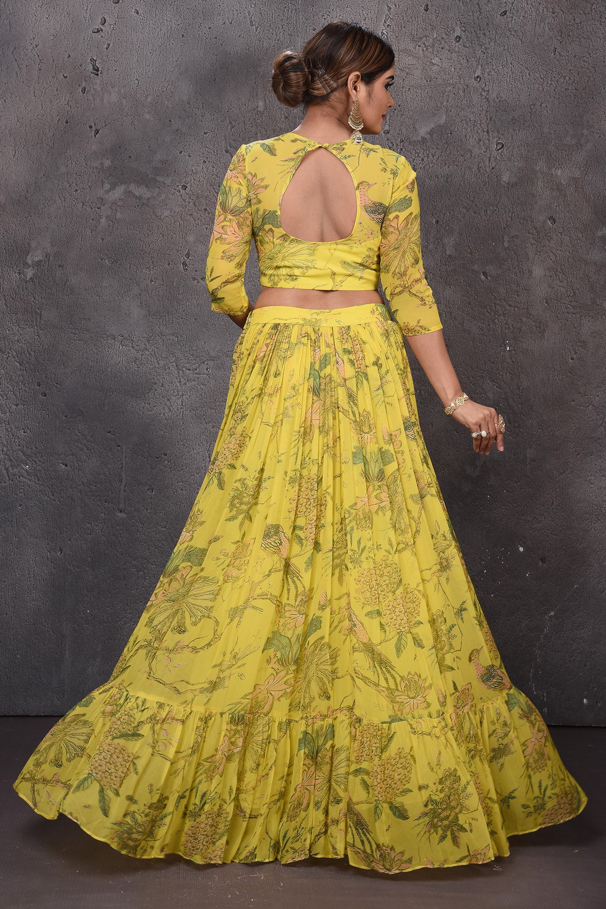 Shop gorgeous yellow floral lehenga online in USA with dupatta. Look royal at weddings in this bespoke designer lehengas, wedding gowns, bridal lehengas, designer sarees, Anarkali suits, sharara suits, from Pure Elegance Indian fashion store in USA.-back