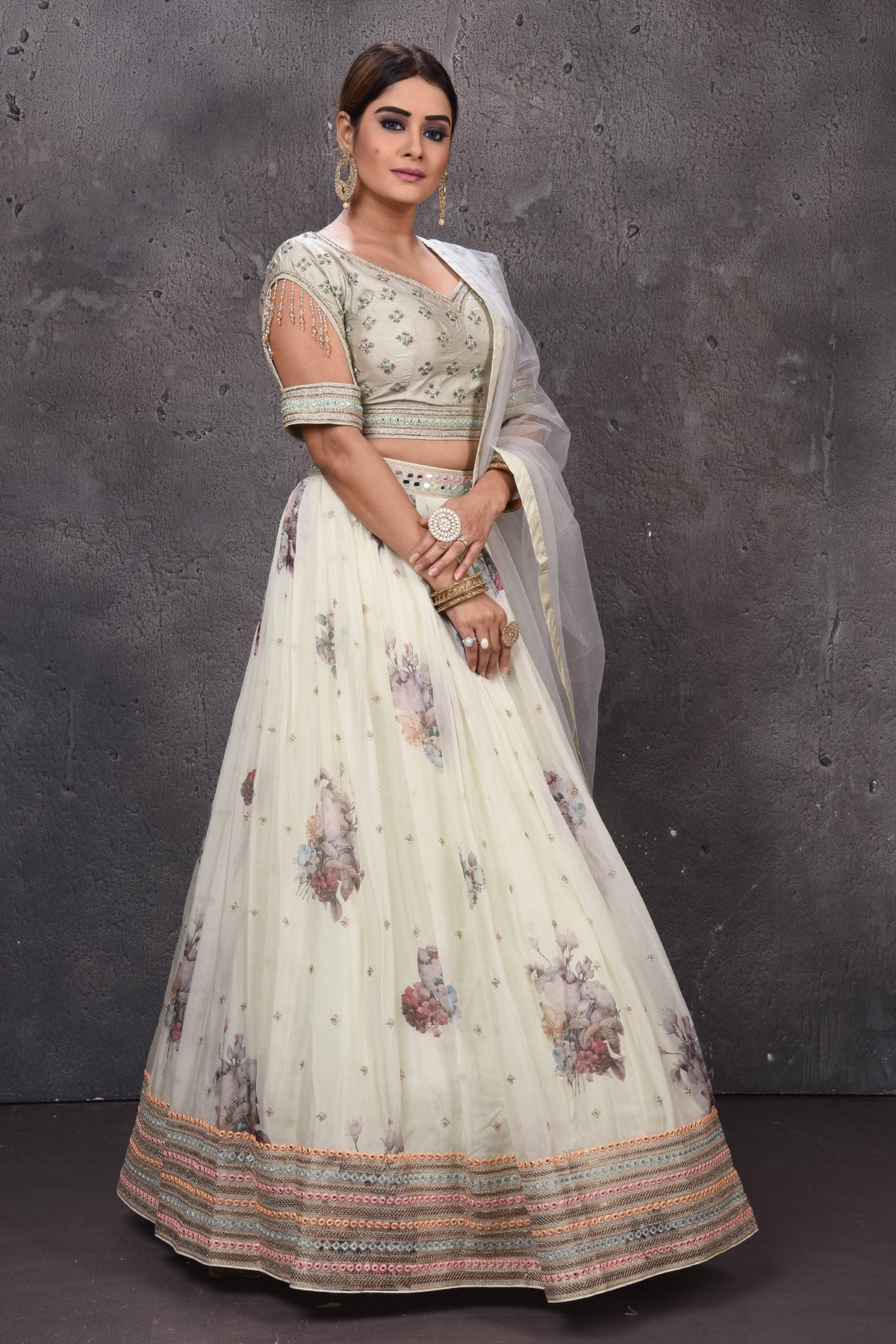 Buy stunning off-white embroidered Anarkali suit online in USA with dupatta. Look royal at weddings in this bespoke designer lehengas, wedding gowns, bridal lehengas, designer sarees, Anarkali suits, sharara suits, from Pure Elegance Indian fashion store in USA.-side