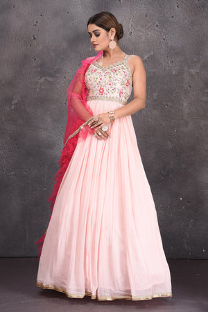 Buy beautiful powder pink embroidered Anarkali suit online in USA with dupatta. Look royal at weddings in this bespoke designer lehengas, wedding gowns, bridal lehengas, designer sarees, Anarkali suits, sharara suits, from Pure Elegance Indian fashion store in USA.-front