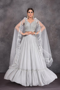 Buy stunning grey contemporary lehenga online in USA with ruffle dupatta. Look royal at weddings in this bespoke designer lehengas, wedding gowns, bridal lehengas, designer sarees, Anarkali suits, sharara suits, from Pure Elegance Indian fashion store in USA.-full view
