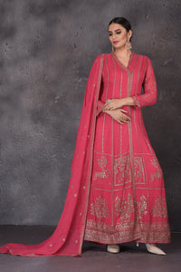 Shop beautiful pink embroidered floorlength Anarkali online in USA with dupatt.a Look elegant at weddings and festive occasions in exclusive designer suits, designer gowns, Anarkali suits, sharara suits, bridal gowns, palazzo suits from Pure Elegance Indian clothing store in USA.-full view