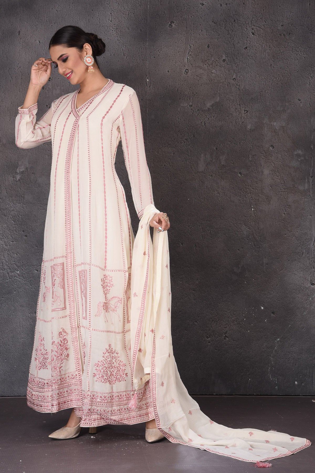Buy gorgeous cream embroidered floorlength suit online in USA with dupatta. Look elegant at weddings and festive occasions in exclusive designer suits, designer gowns, Anarkali suits, sharara suits, bridal gowns, palazzo suits from Pure Elegance Indian clothing store in USA.-dupatta