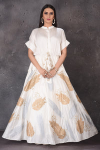 Shop stunning white skirt set online in USA with golden leaf print. Look elegant at weddings and festive occasions in exclusive designer suits, designer gowns, Anarkali suits, sharara suits, bridal gowns, palazzo suits, designer lehenga from Pure Elegance Indian clothing store in USA.-full view